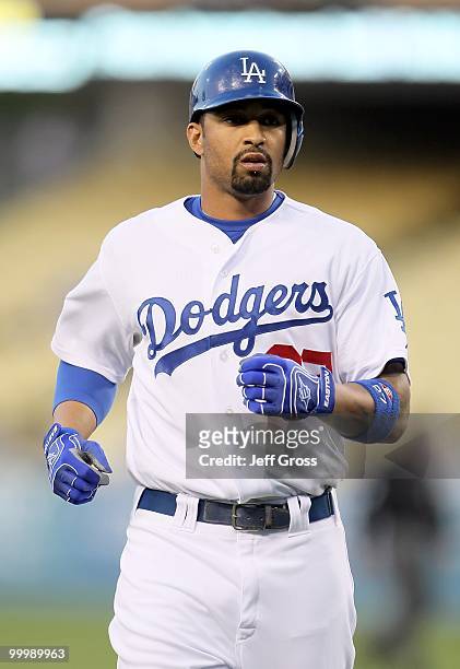 Matt Kemp of the Los Angeles Dodgers runs back to the dugout against the Milwaukee Brewers at Dodger Stadium on May 6, 2010 in Los Angeles,...