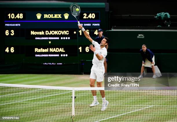 Novak Djokovic of Serbia in action against Rafael Nadal of Spain in the semi final of the gentlemen's singles at the All England Lawn Tennis and...