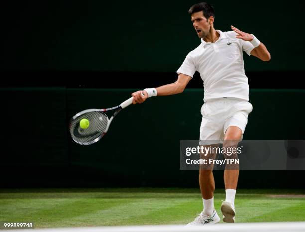 Novak Djokovic of Serbia in action against Rafael Nadal of Spain in the semi final of the gentlemen's singles at the All England Lawn Tennis and...