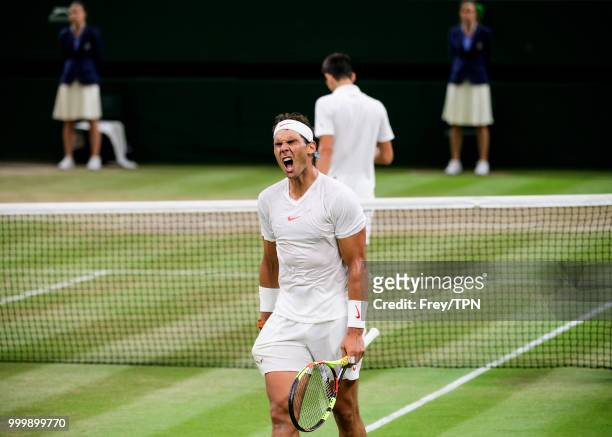 Rafael Nadal of Spain looks frustrated against Novak Djokovic of Serbia in the semi final of the gentlemen's singles at the All England Lawn Tennis...