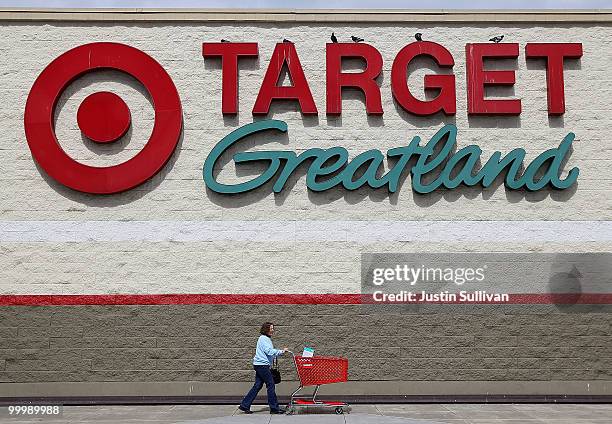 Target customer walks out of a Target store May 19, 2010 in Daly City, California. Target reported first quarter earnings up 29 percent to $671...