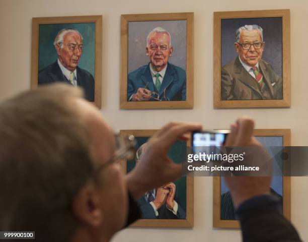 Visitors of the 'cititzens' festival' of German President Steinmeier stand in the Ehrenhof hall of the Bellevue Palace in Berlin, Germany, 9...