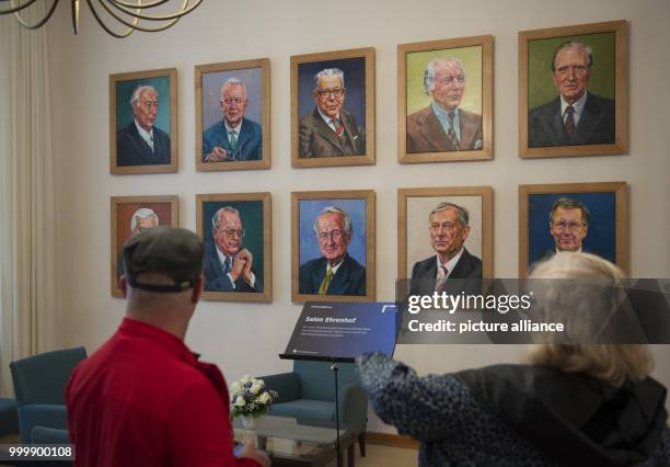 Visitors of the 'cititzens' festival' of German President Steinmeier stand in the Ehrenhof hall of the Bellevue Palace in Berlin, Germany, 9...