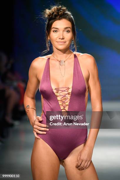 Model walks the runway for Pikai Swimwear at Miami Swim Week powered by Art Hearts Fashion Swim/Resort 2018/19 at Faena Forum on July 15, 2018 in...