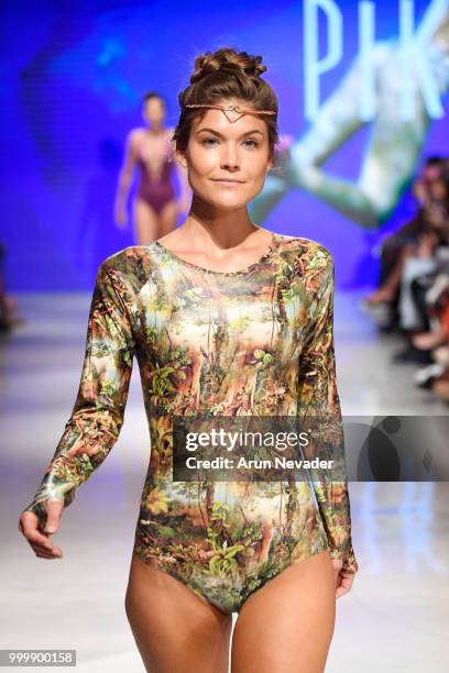 Model walks the runway for Pikai Swimwear at Miami Swim Week powered by Art Hearts Fashion Swim/Resort 2018/19 at Faena Forum on July 15, 2018 in...