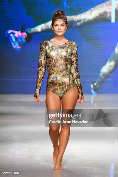 Model walks the runway for Pikai Swimwear at Miami Swim Week powered by Art Hearts Fashion Swim/Resort 2018/19 at Faena Forum on July 15, 2018 in...