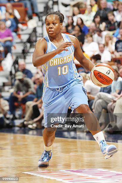 Epiphanny Prince of the Chicago Sky dribbles the ball against the Connecticut Sun during the WNBA game on May 15, 2010 at Mohegan Sun Arena in...