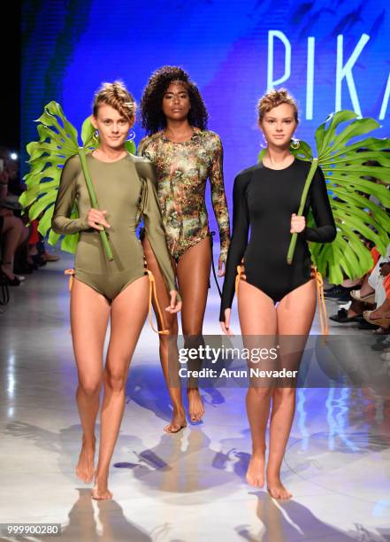 Models walk the runway for Pikai Swimwear at Miami Swim Week powered by Art Hearts Fashion Swim/Resort 2018/19 at Faena Forum on July 15, 2018 in...