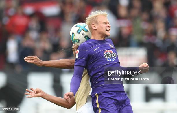 Ingolstadt's Marvin Matip and Aue's Sören Bertram vie for the ball during the German 2nd Bundesliga soccer mathc between FC Ingolstadt and Erzgebirge...