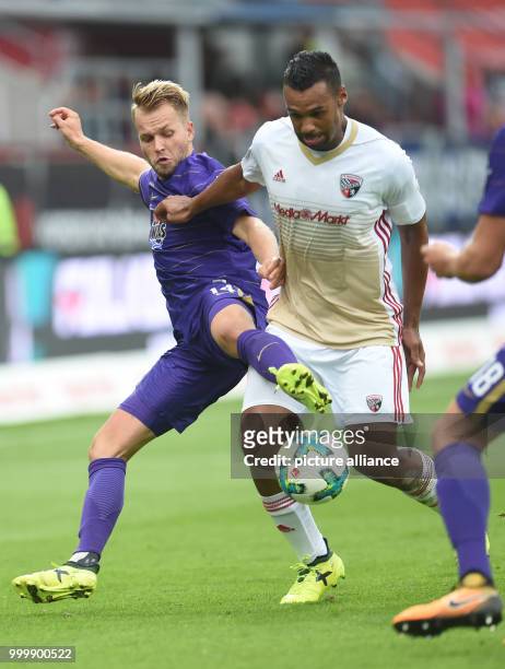 Ingolstadt's Marvin Matip and Aue's Pascal Köpke vie for the ball during the German 2nd Bundesliga soccer mathc between FC Ingolstadt and Erzgebirge...