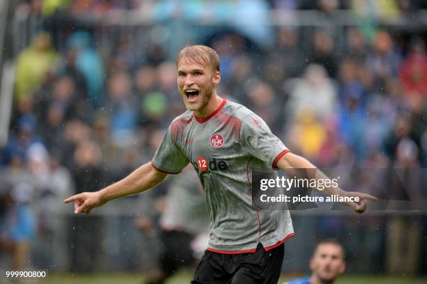 Kaiserslautern's Sebastian Andersson celebrates after levelling the score at 1:1 during the German 2nd Bundesliga soccer match between Holstein Kiel...