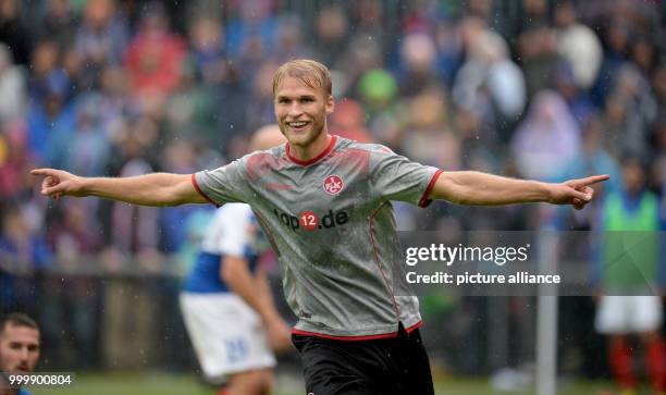 Kaiserslautern's Sebastian Andersson celebrates after levelling the score at 1:1 during the German 2nd Bundesliga soccer match between Holstein Kiel...