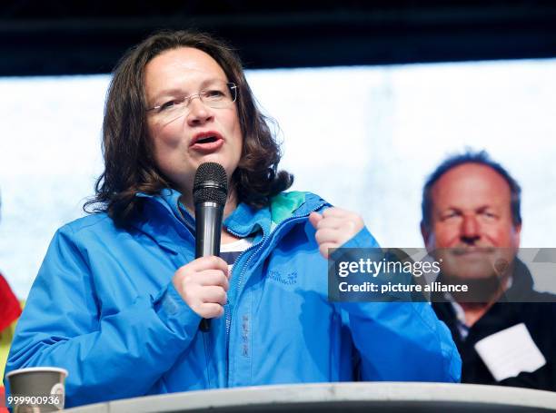 German labour minister Andrea Nahles speaks at a demonstration in favour of binding, union-negotiated contracts covering all workers in in individual...