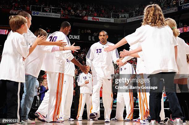 Grant Hill of the Phoenix Suns high is introduced before the game against the New Orleans Hornets on March 14, 2010 at US Airways Center in Phoenix,...