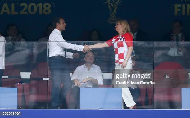 President of Croatia Kolinda Grabar-Kitarovic celebrates the first goal for Croatia with President of France Emmanuel Macron during the 2018 FIFA...