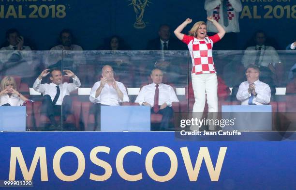 President of Croatia Kolinda Grabar-Kitarovic celebrates the first goal for Croatia while President of France Emmanuel Macron, FIFA President Gianni...