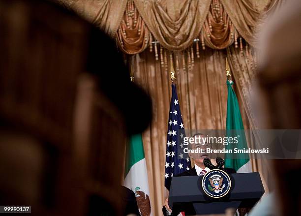 Mexico's President Felipe Caldero speaks during a luncheon at the U.S. State Department May 19, 2010 in Washington, DC. Secretary of State Hillary...
