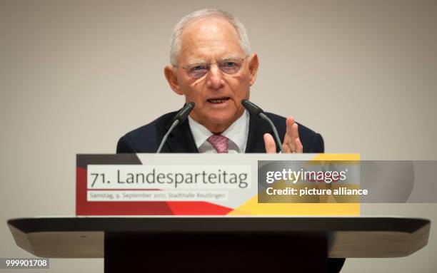 German finance minister Wolfgang Schäuble gives a talk to party members at the CDU's convention in the City Hall in Reutlingen, Germany, 9 September...