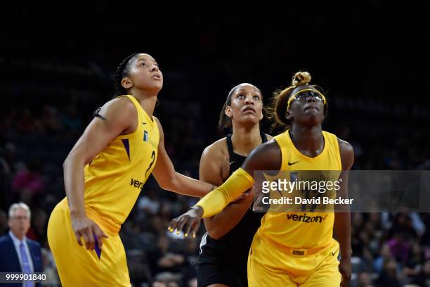 Candace Parker of the Los Angeles Sparks, A'ja Wilson of the Las Vegas Aces, and Essence Carson of the Los Angeles Sparks wait for the ball on July...