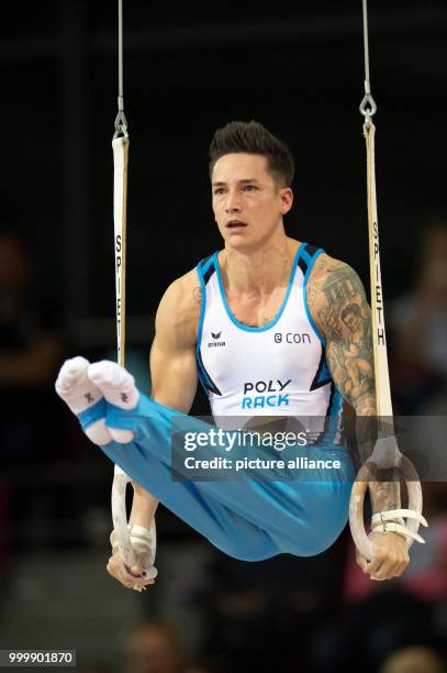 Marcel Nguyen in action on the rings during the national qualifying for the World Gymnastics Championships at the SCHARRena in Stuttgart, Germany, 9...