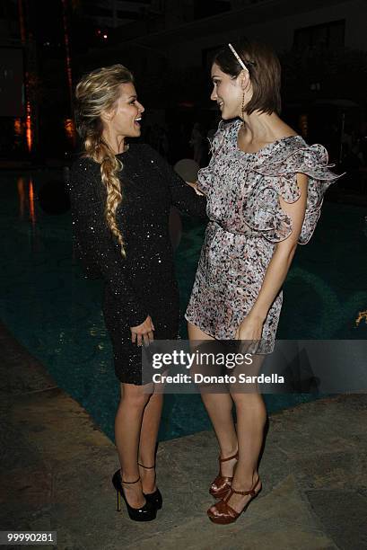 Actresses Carmen Electra and Katharine McPhee attend Nyx Cosmetics Decade +1 Anniversary Unveild on May 18, 2010 in Hollywood, California.