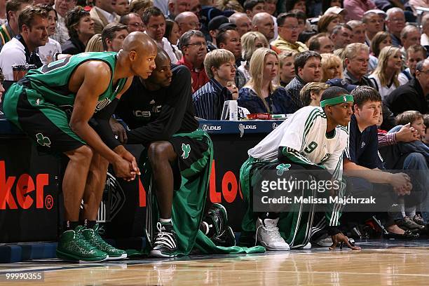 Ray Allen, Kevin Garnett and Rajon Rondo of the Boston Celtics wait to enter the game against the Utah Jazz at EnergySolutions Arena on March 22,...
