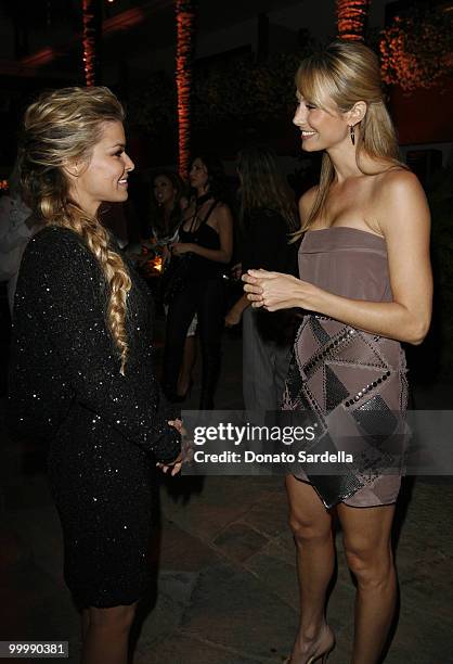 Actress Carmen Electra and Stacy Keibler attend Nyx Cosmetics Decade +1 Anniversary Unveild on May 18, 2010 in Hollywood, California.