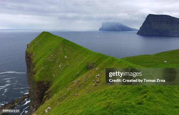 seaside cliffs kallur lighthouse - temas stock pictures, royalty-free photos & images