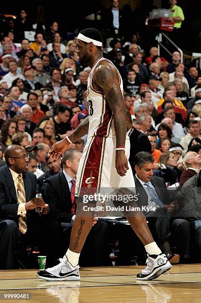 LeBron James of the Cleveland Cavaliers walks to the bench in Game Five of the Eastern Conference Semifinals against the Boston Celtics during the...