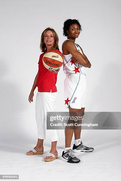 Owner Kathy Betty and Angel McCoughtry of the Atlanta Dream pose for a portrait on 2010 WNBA Media Day on May 13, 2010 at Philips Arena in Atlanta,...