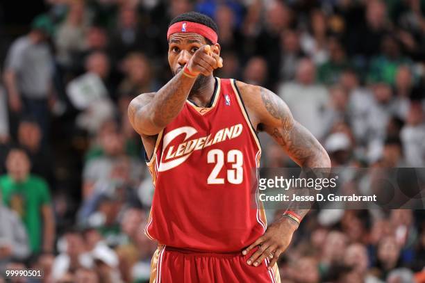 LeBron James of the Cleveland Cavaliers points across the court in Game Six of the Eastern Conference Semifinals against the Boston Celtics during...
