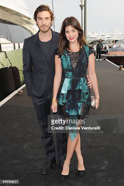 Models Robert Konjic and Julia Restoin Roitfeld attend the Fair Game Cocktail Party hosted by Giorgio Armani held aboard his boat 'Main' during the...