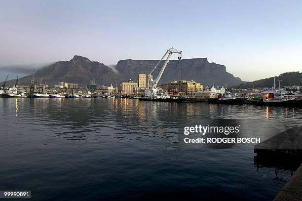 View of Cape Town Harbour, with Table Mountain, in the background, on May 19, in Cape Town. South Africa will host the FIFA World Cup from the 11 of...