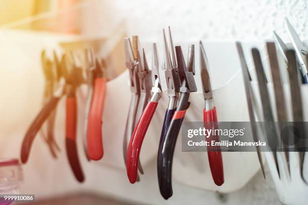 tools in goldsmith workshop - laubsäge stock-fotos und bilder