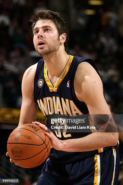 Josh McRoberts of the Indiana Pacers looks to shoot a free throw against the Cleveland Cavaliers during the game at Quicken Loans Arena on April 9,...