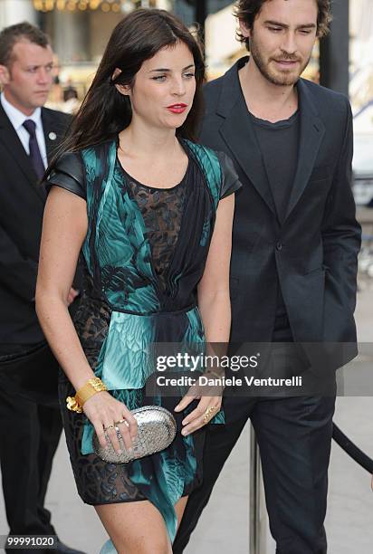 Models Julia Restoin Roitfeld and Robert Konjic attend the Fair Game Cocktail Party hosted by Giorgio Armani held aboard his boat 'Main' during the...