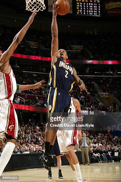 Earl Watson of the Indiana Pacers puts a shot up against the Cleveland Cavaliers during the game at Quicken Loans Arena on April 9, 2010 in...