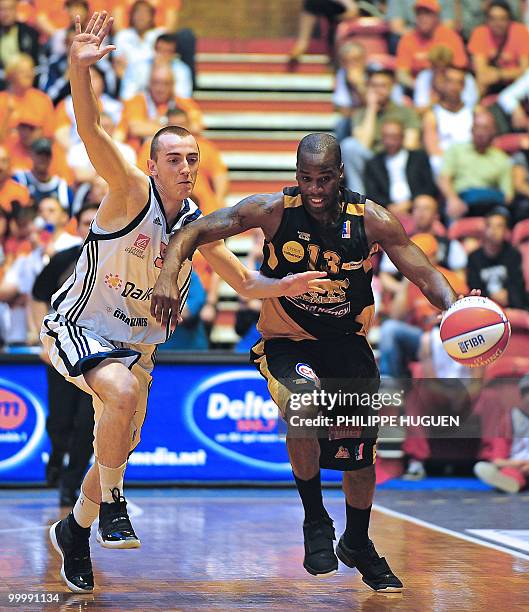 Nancy's Steed Tchicamboud tries to escape from Gravelines's Rouselle during their basketball ProA quarter final play-off in Gravelines, on May 19 Mai...