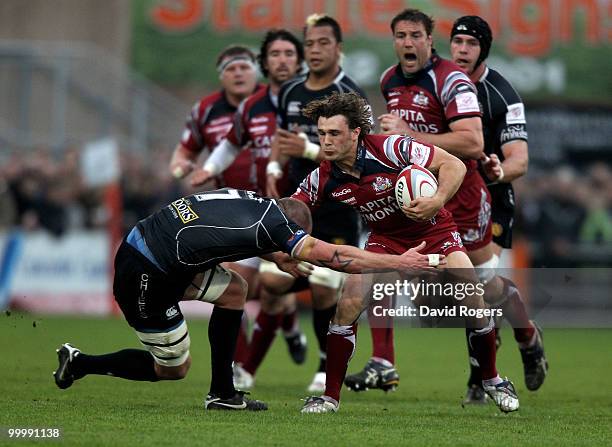 Thomas Arscott of Bristol is tackled by James Scaysbrook during the Championship playoff final match, 1st leg between Exeter Chiefs and Bristol at...