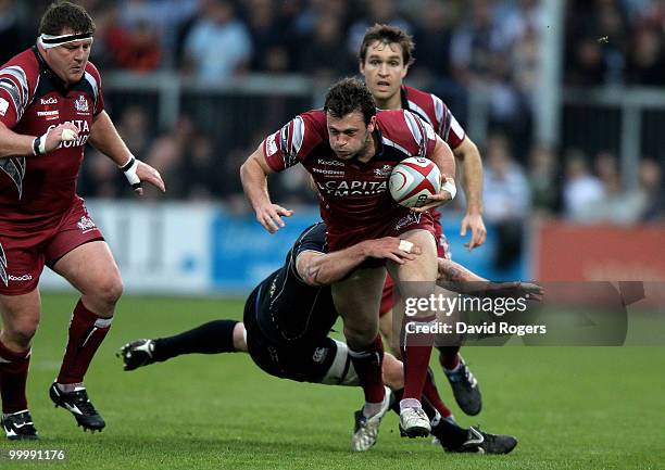 Luke Arscott of Bristol is tackled by James Scaysbrook during the Championship playoff final match, 1st leg between Exeter Chiefs and Bristol at...
