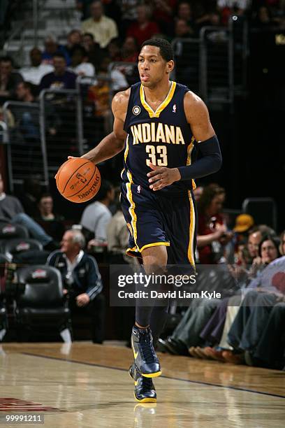 Danny Granger of the Indiana Pacers drives the ball against the Cleveland Cavaliers during the game at Quicken Loans Arena on April 9, 2010 in...