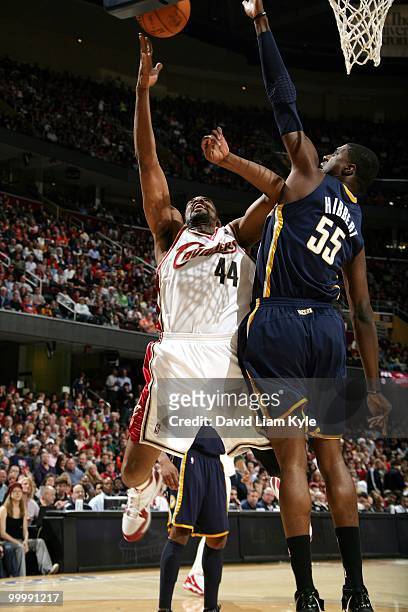 Leon Powe of the Cleveland Cavaliers puts a shot up against Roy Hibbert of the Indiana Pacers during the game at Quicken Loans Arena on April 9, 2010...