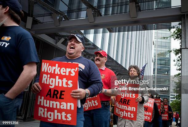 Members of the United Steelworkers union demonstrate to protest Mexican President Felipe Calderon's state visit to Washington outside the Mexican...