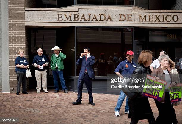 Members of the United Steelworkers union demonstrate to protest Mexican President Felipe Calderon's state visit to Washington outside the Mexican...