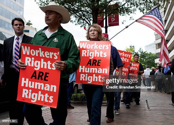 Members of the United Steelworkers union demonstrate to protest Mexican President Felipe Calderon's state visit to Washington outside the Mexican...