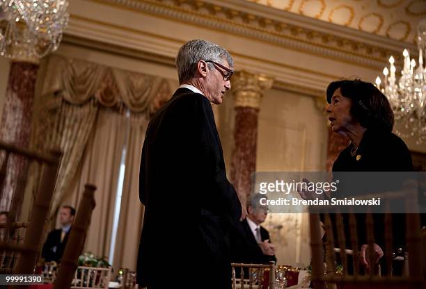 Robert Rubin, former Secretary of the Treasury, former Goldman Sachs board member and former Director of Citi Group, speaks with a guest before a...