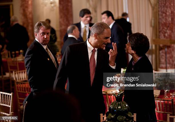 Attorney General Eric H. Holder Jr. Speaks with White House advisor Valerie Jarrett before a luncheon at the US State Department May 19, 2010 in...