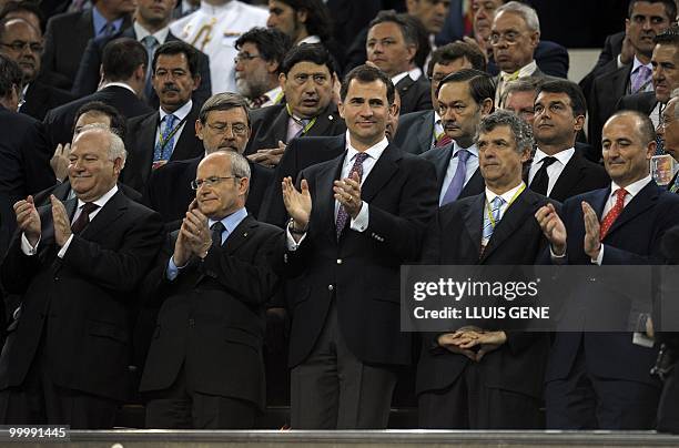 Spain's Prince Felipe applauds before the King�s Cup final match Sevilla against Atletico Madrid at the Camp Nou stadium in Barcelona on May 19,...