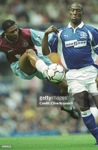 Rigobert Song of West Ham jumps in to Kevin Campbell of Everton during the match between Everton and West Ham United in the FA Barclaycard...