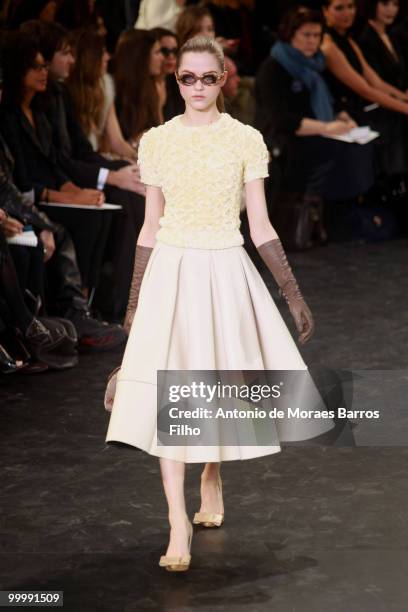Model walks the runway during the Louis Vuitton Ready to Wear show as part of the Paris Womenswear Fashion Week Fall/Winter 2011 at Cour Carree du...